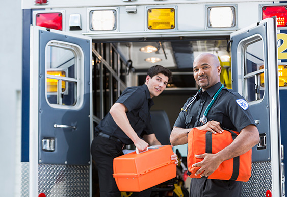 Two EMTs in front of ambulance.jpg