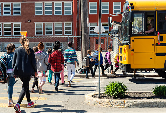 school bus and school kids outside.jpg